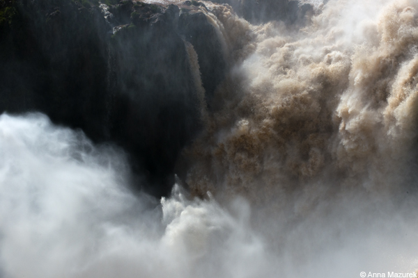 A view of the water crashing against rocks from the Upper Circuit Trail, Iguazu Falls, Argentina